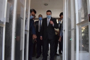 The University president insect the sterilization walk-through gates in the faculty of engineering/ shubra